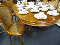 Extending Oval Dining Table with 4 High Seat Chairs with Bergere Seats and Backs in Medium Cherry