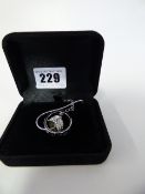 Silver Coloured Necklace with Ring and Heart Charm