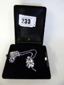 Silver Coloured Necklace with Flower Pendant