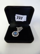 Silver Coloured Necklace with Wheel Charm with Blue Stone