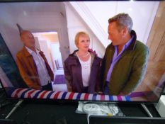 *PANASONIC MODEL TX48CX400B FLATSCREEN TV WITH REMOTE