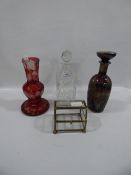 Two glass decanter, cranberry vase, display casket