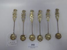 small collection of small silver spoons