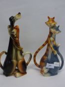 2 x comical figurines of cats and dogs