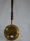 a brass bed pan