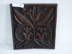 carved wooden plaque