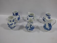 6 royal worcester blue and white miniature jugs