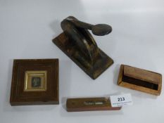 Framed Penny Black, used snuff box, stamp press and small level