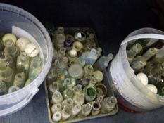 3 containers of hen laying eggs and vintage bottles