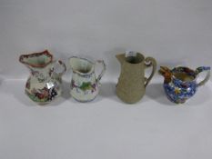 Collection of four assorted jugs