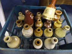 a crate of advertising ceramic bottles