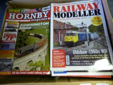 Box containing various model railway magazines