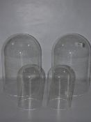 Two large and two small glass domes