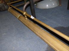 Extending brass fire guard