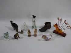 Collection of miniature ornaments, glass birds, shoes and cocktail sticks