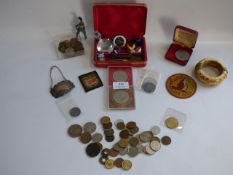 box containing mixed coinage, bracelets, sew on badges etc