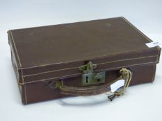 small leather suit case