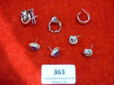 collection of gold earings