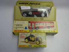 Boxed dinky 283 single decker bus and a boxed dinky 109 model T ford plus one other