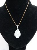 Opal and diamond pendant on chain