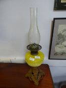 Yellow and Cast Oil Lamp