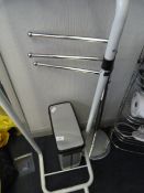 Waste bin, towel rail and a bed frame