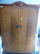 Large mahogany wardrobe on cabriole legs