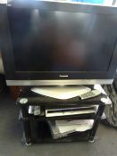 Panasonic model tx32lxd 600 flat screen TV complete with stand and Panasonic DVD and VCR players