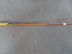 Twelve bore and a .22 cleaning rod