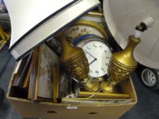 Box containing embroidered pictures, clock, two lamps with shades, etc