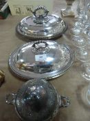 Two silver plate tureens and a covered dish