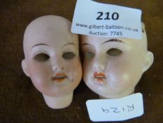 Two Armand Marsel porcelain dolls heads