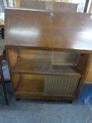 Oak bureau bookcase enclosed by sliding frosted glass doors