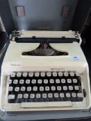 Remington portable typewriter in carry case