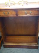 Reproduction figured mahogany open fronted bookcase with draws