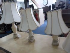 Three Alabaster lamps with shades