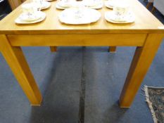 *Square solid oak dining table on four square legs