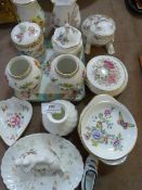 Assorted floral pottery and decorative frogs, trinket dishes, etc