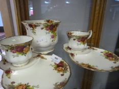 Royal Albert country roses cup, saucers, and bowl