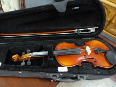 Child's violin in case