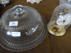 Glass cake dome and mantel clock