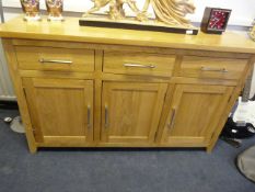Light oak sideboard with chrome handles