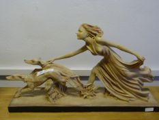 Ornamental figurine of a lady with greyhounds