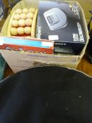Box containing personal CD player, foot massager ,DVDs, CDs, videos, lap tray, etc