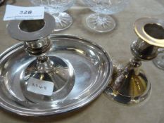two silver plated candle sticks and a dish