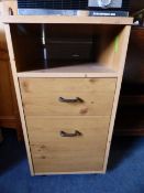 Two door bedside cabinet in pine finish