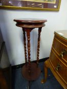 Circular plant stand on barley twist supports