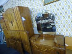 Walnut four piece suite comprising of ladies and gent's wardrobe, bedhead and foot and matching