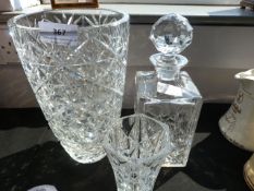 Two cut glass vases and a decanter