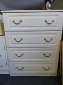 White chest of four drawers brass drop handles